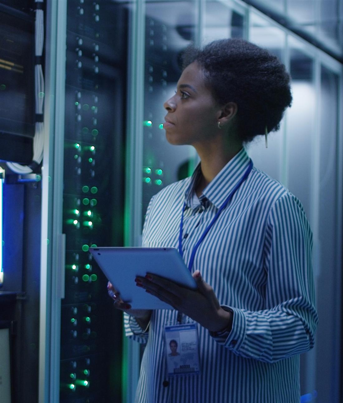 Engineer inspecting secure server infrastructure